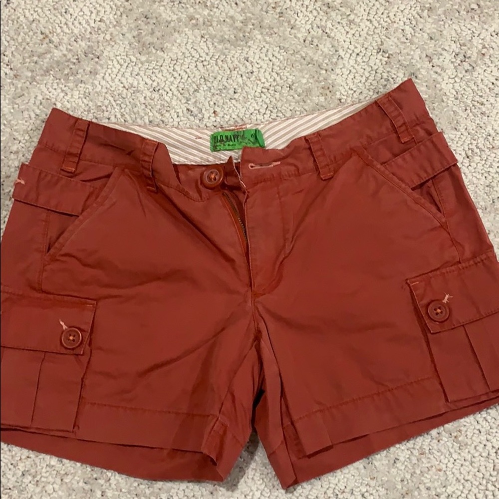 Low-waisted, rust colored shorts